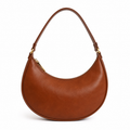 Front view of brown crescent leather shoulder bag.
