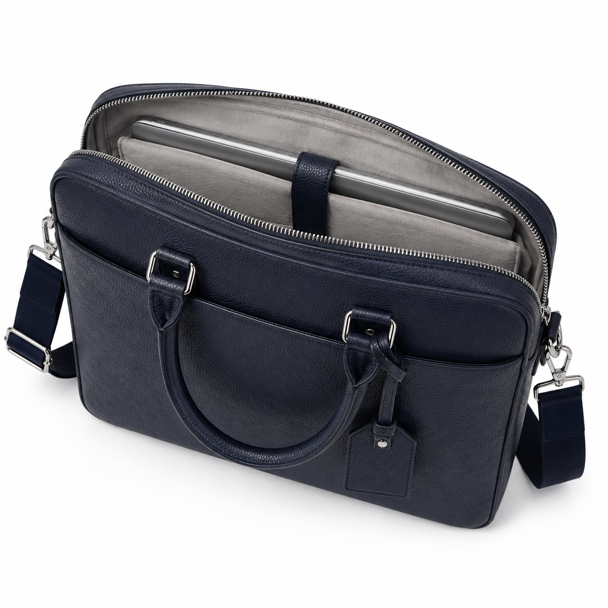 Close-up of zip closure on navy leather briefcase.