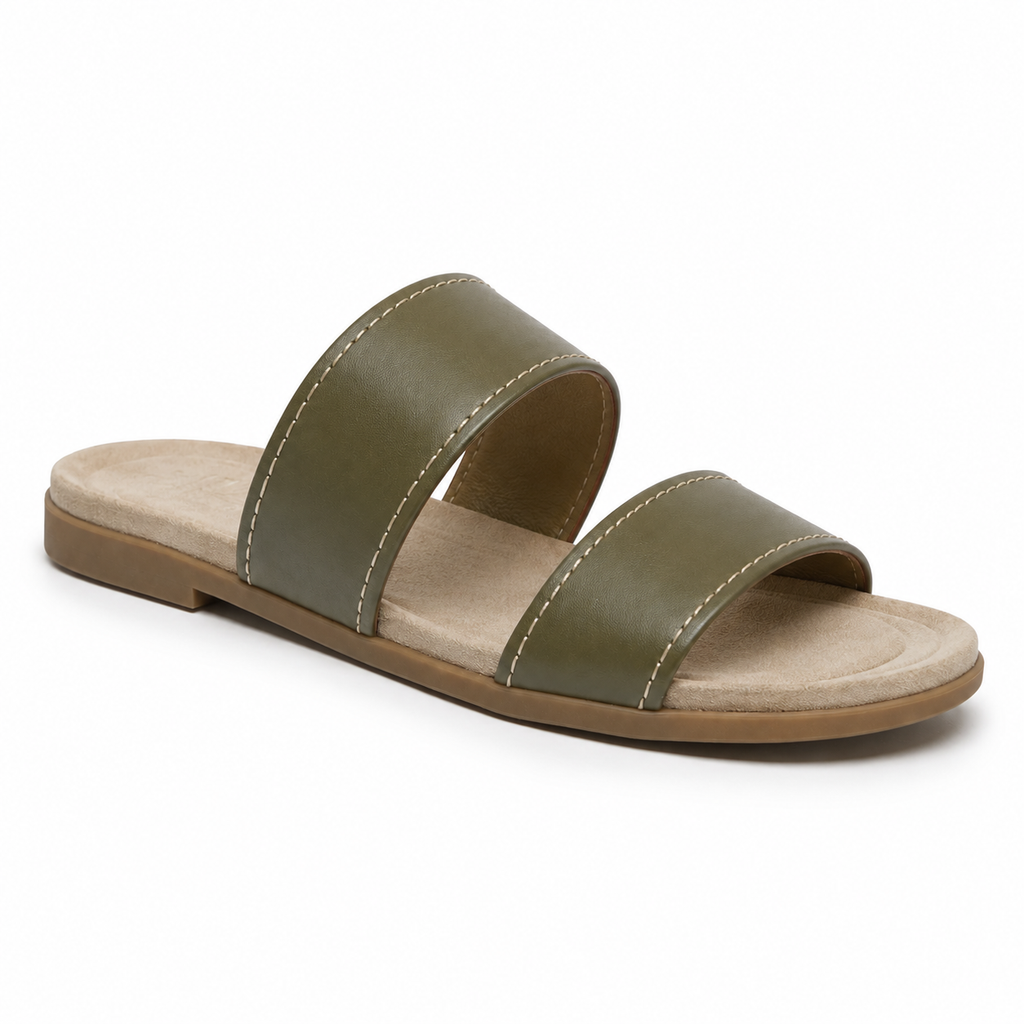 Detail of leather strap on green slide sandal