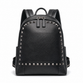 Front view of black leather backpack with studs