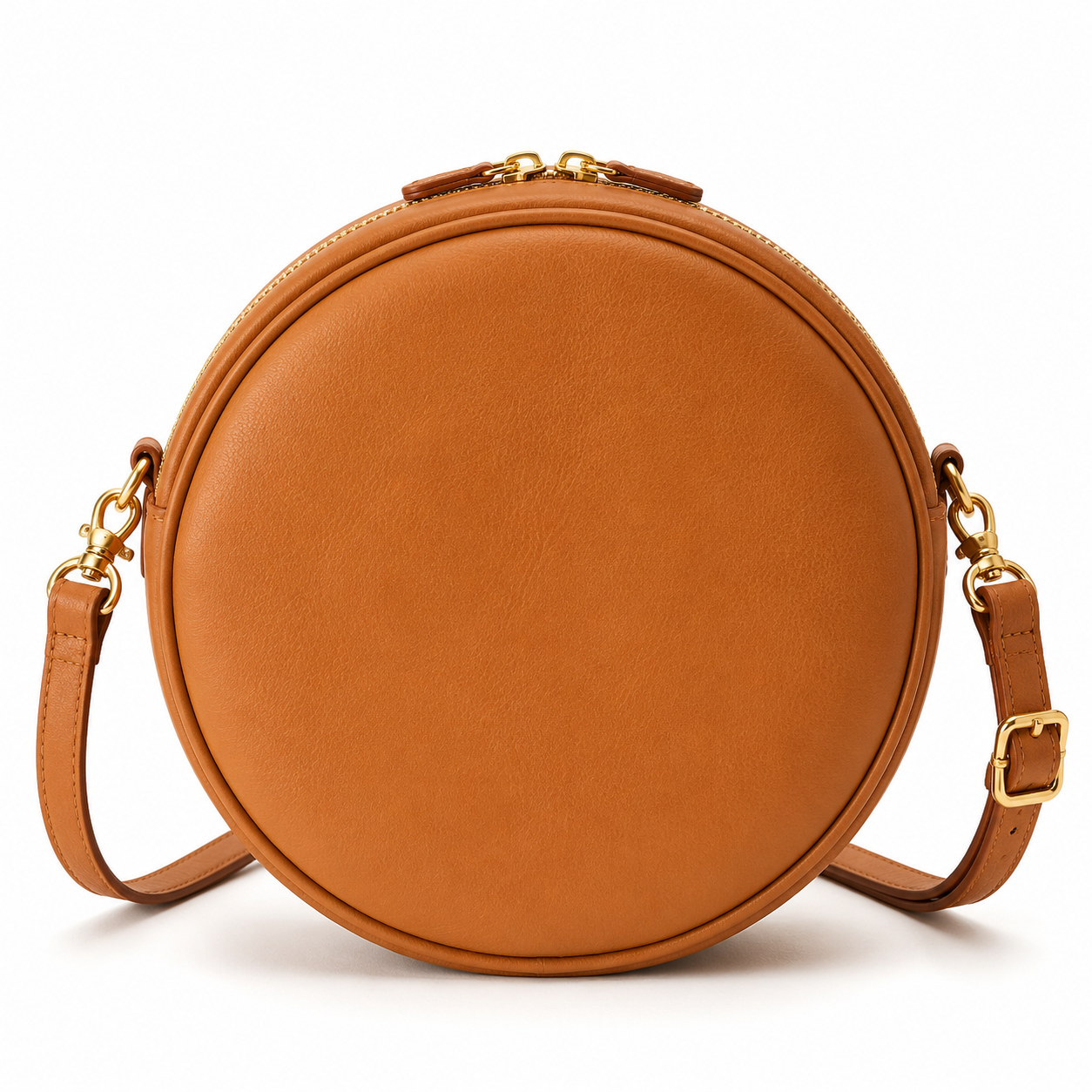 Round tan faux leather crossbody bag front view