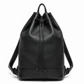Front view of boneroshop Leather Drawstring Backpack in black.