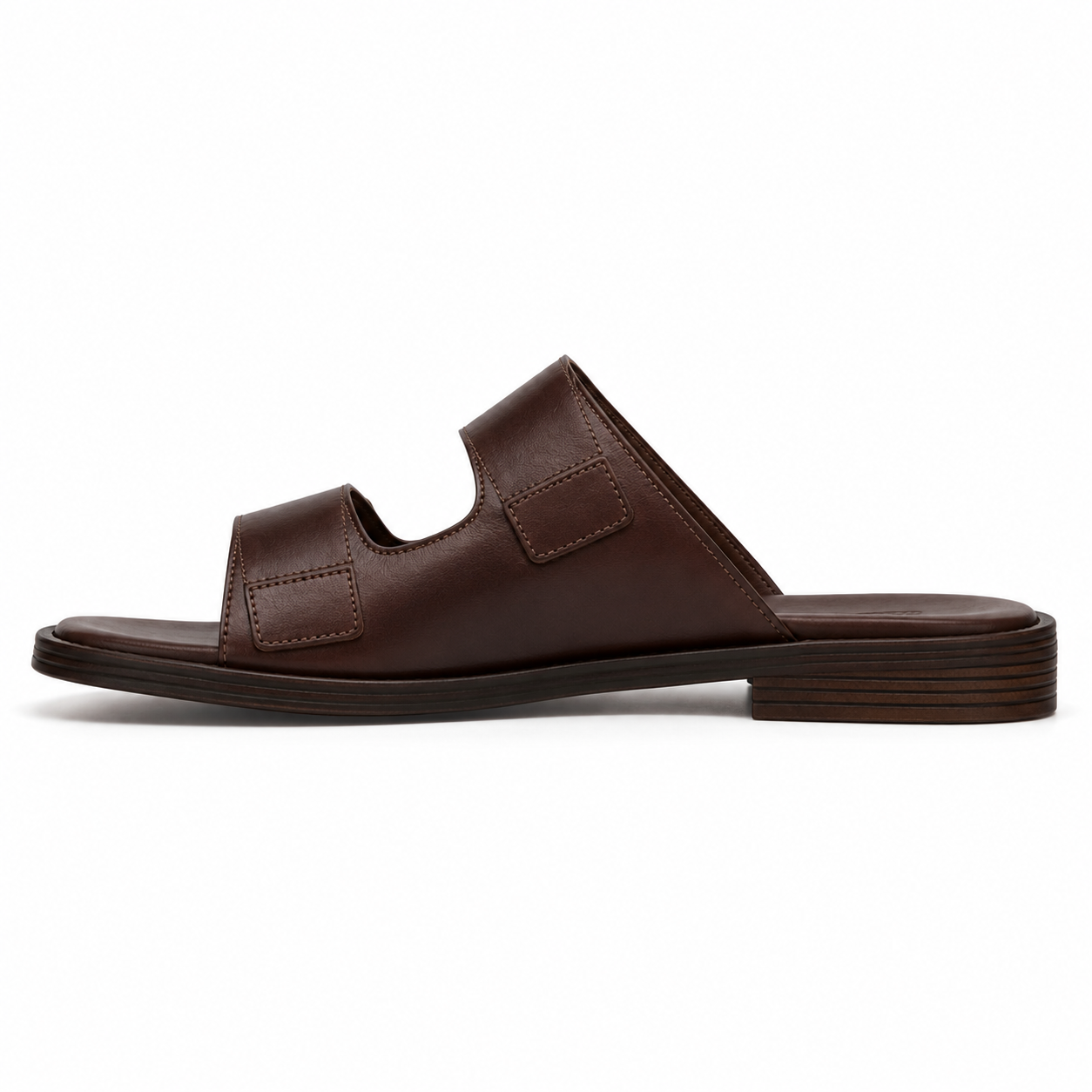Men's double-buckle vegan leather sandal in dark walnut with two antique brass buckles and stacked leather sole, three-quarter view