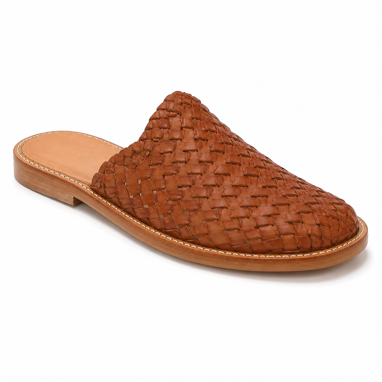 Inner side view of men's cognac woven vegan leather mule showing open-back slip-on silhouette and edge-stitched leather sole