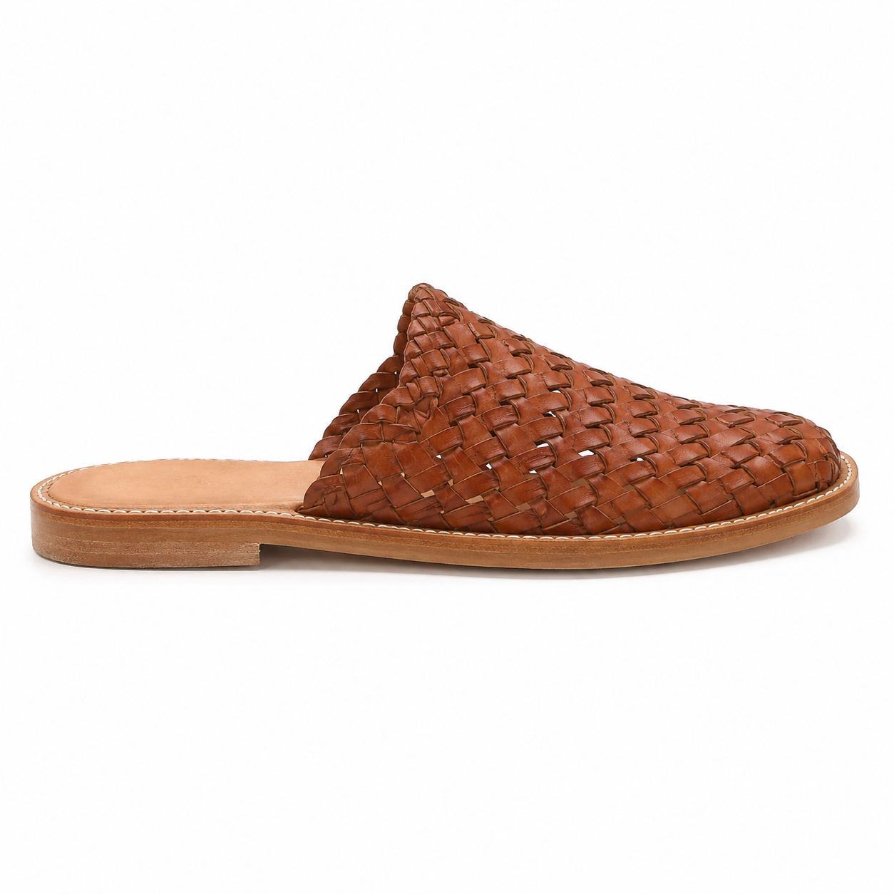 Front view of men's cognac woven vegan leather mule showing closed-toe construction and intricate weave pattern
