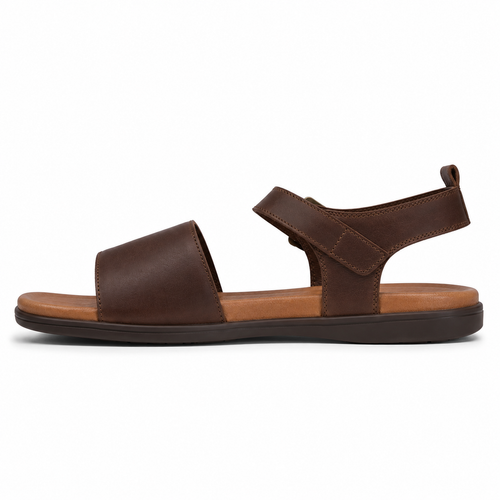 Men's classic single-buckle vegan leather sandal in chestnut brown with antique brass ankle buckle and cushioned tan footbed, three-quarter view