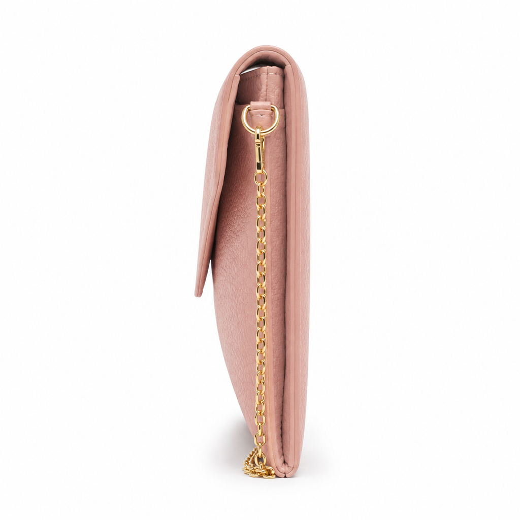Close-up of magnetic closure on pink clutch bag.