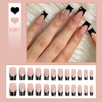 Acrylic Nail Set with Elegant Black and White Design and Glitter Accents