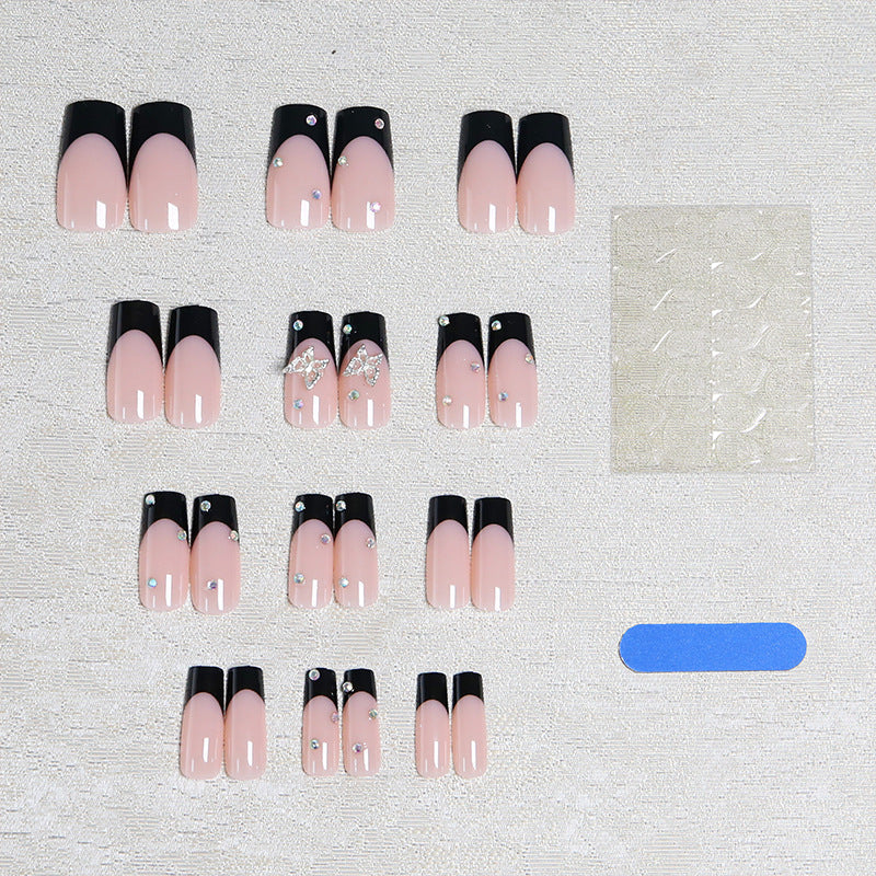Acrylic Nail Set with Elegant Black and White Design and Glitter Accents