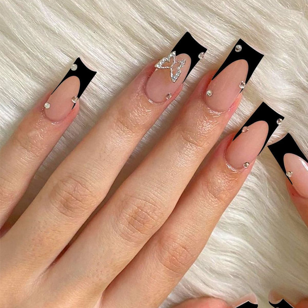 Acrylic Nail Set with Elegant Black and White Design and Glitter Accents