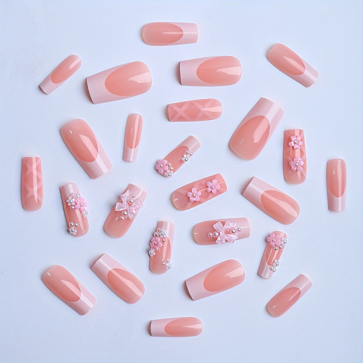 Acrylic nail set with elegant 3D flowers and ribbon decorations
