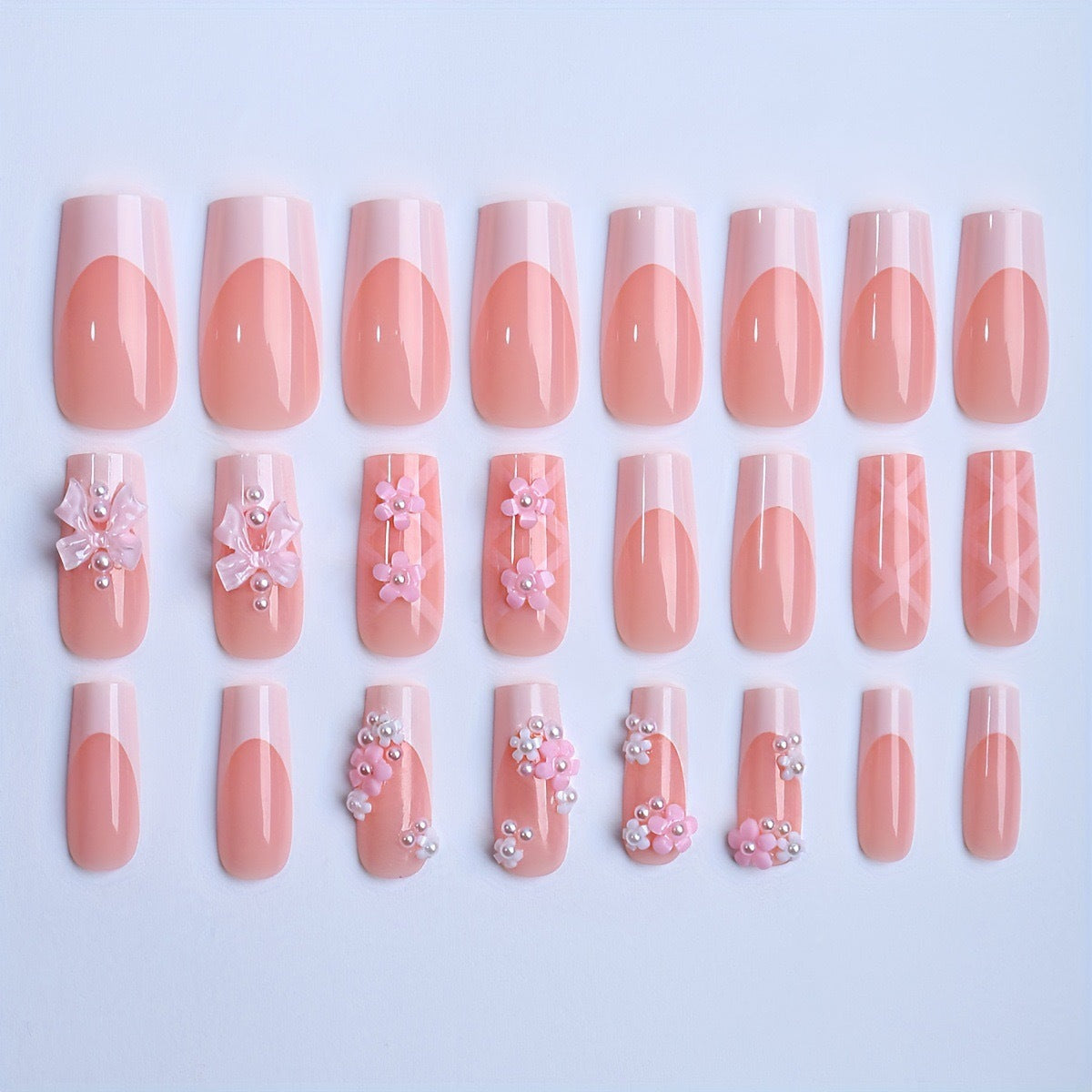 Acrylic nail set with elegant 3D flowers and ribbon decorations