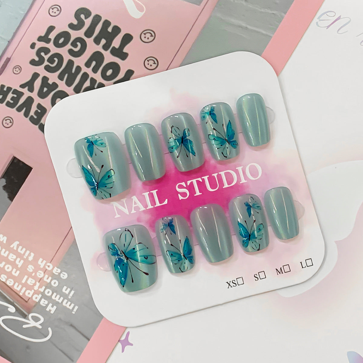 Artistic Acrylic Nails with Butterfly Motif
