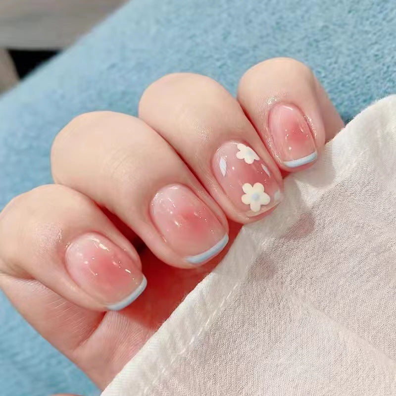 Artistic Gel Nails with Delicate Floral Designs
