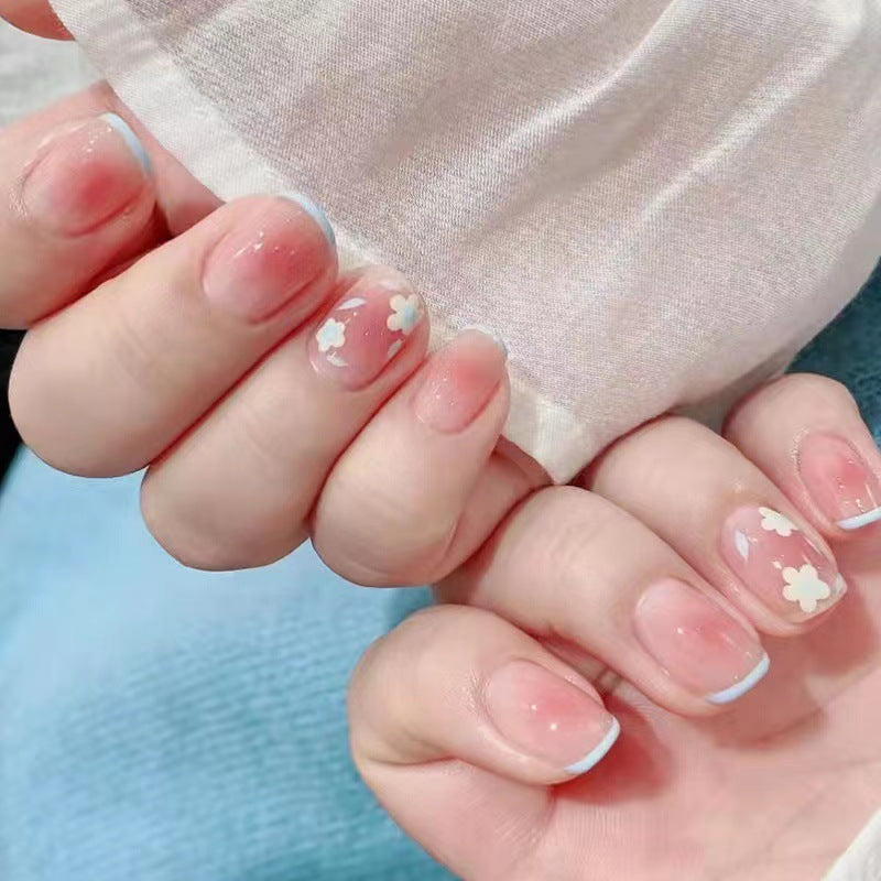 Artistic Gel Nails with Delicate Floral Designs