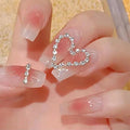 Artistic Gel Nails with Heart Accents