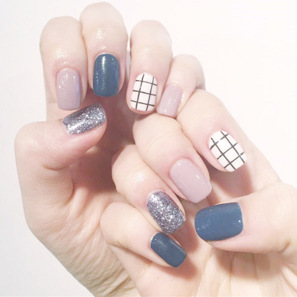 Artistic Nail Design with Glamorous Accents