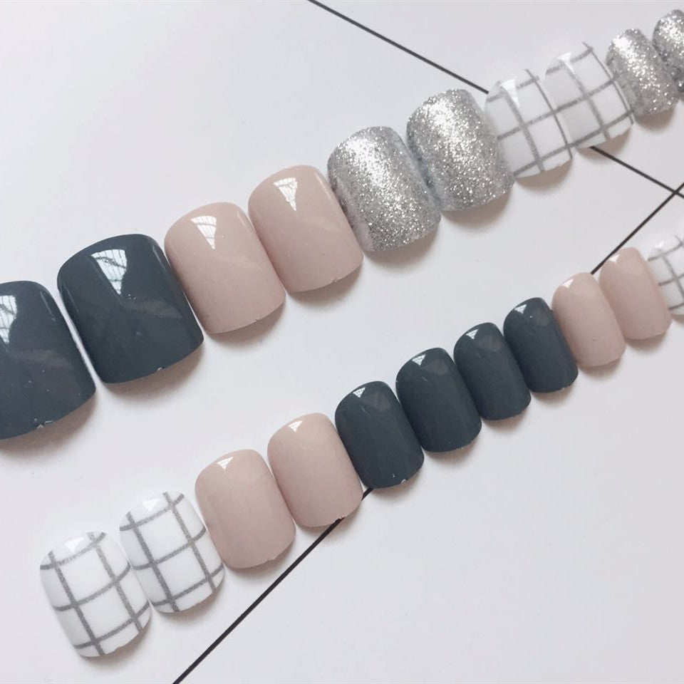 Artistic Nail Design with Glamorous Accents