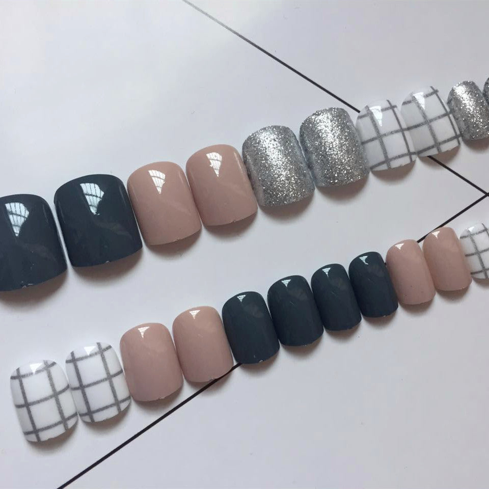 Artistic Nail Design with Glamorous Accents