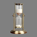 Clear hourglass timer with elegant flow for productive and stylish workspace design