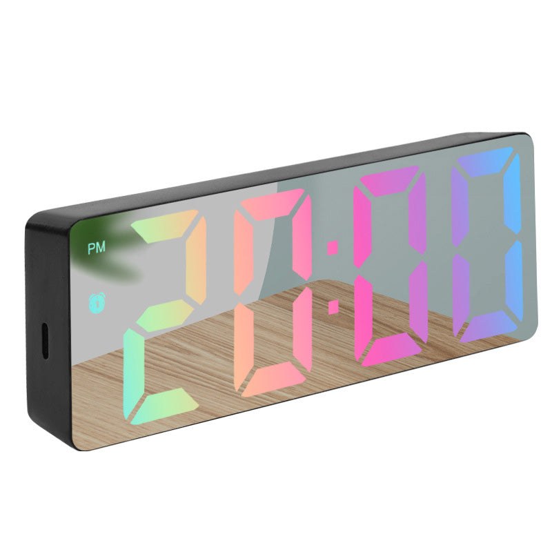 Digital alarm clock with mirror finish