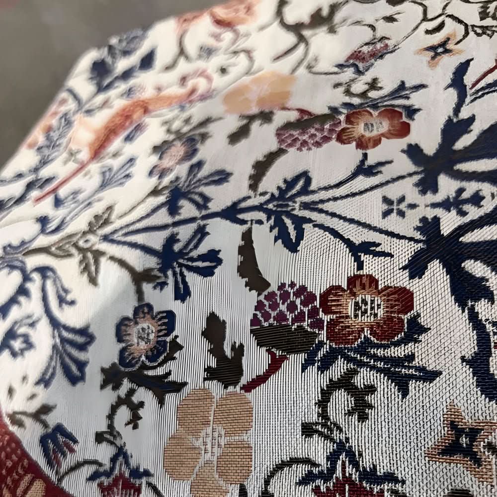 Elegant table runner with floral and bird motif