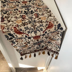 Elegant table runner with floral and bird motif