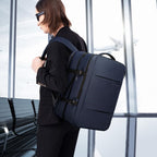 Expandable 26–45L Waterproof Travel Backpack with Laptop Sleeve & Duffle Carry