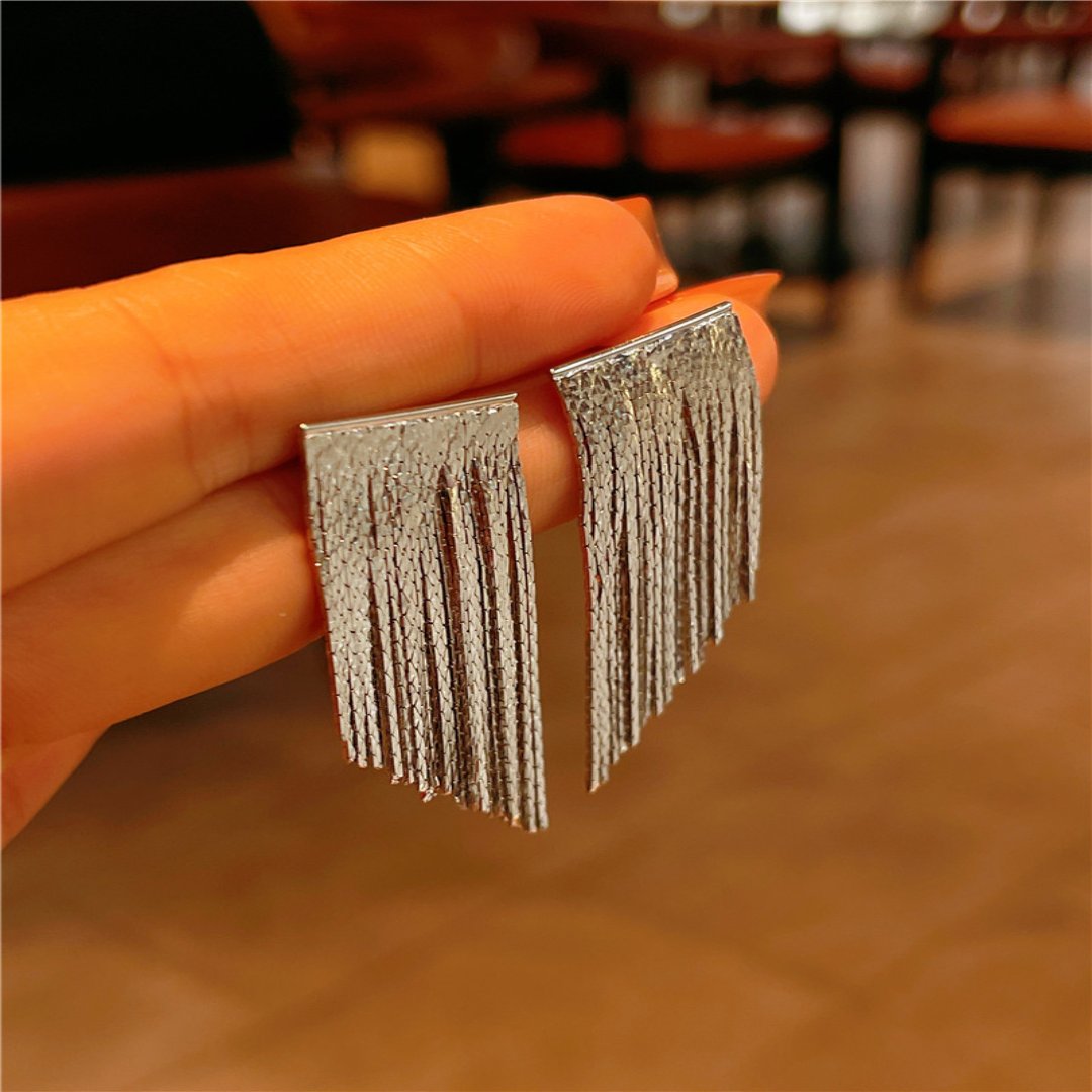 Golden shining city tassel earrings