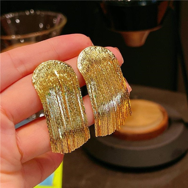 Golden shining city tassel earrings