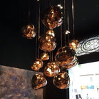 Jessamy | Molten Acrylic Globe Pendant Light with Mirrored Finish for Dining and Kitchen Spaces