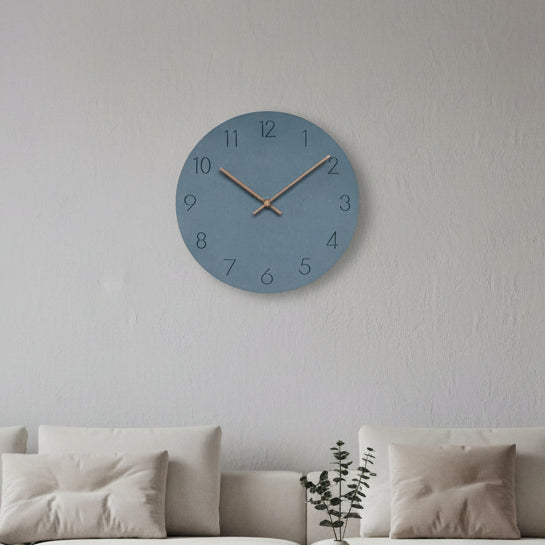Scandinavian minimalist wall clock with wooden hands and silent mechanism