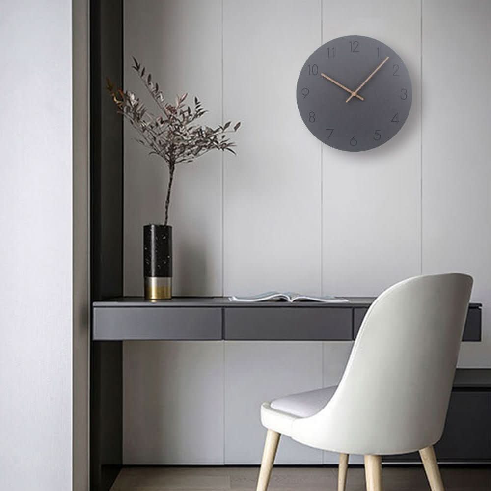 Scandinavian minimalist wall clock with wooden hands and silent mechanism