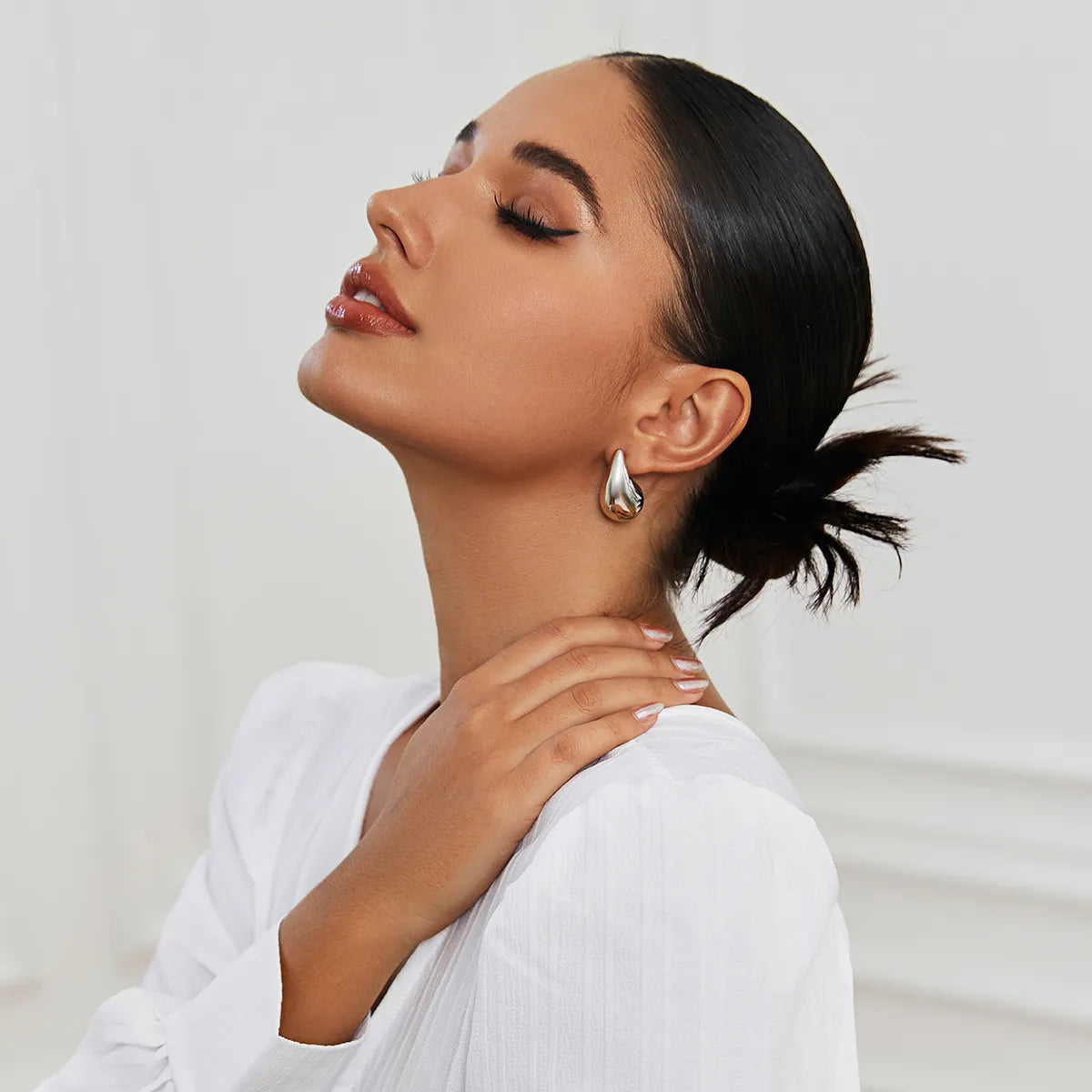 ShineDrop Feminine Statement Glow Earrings