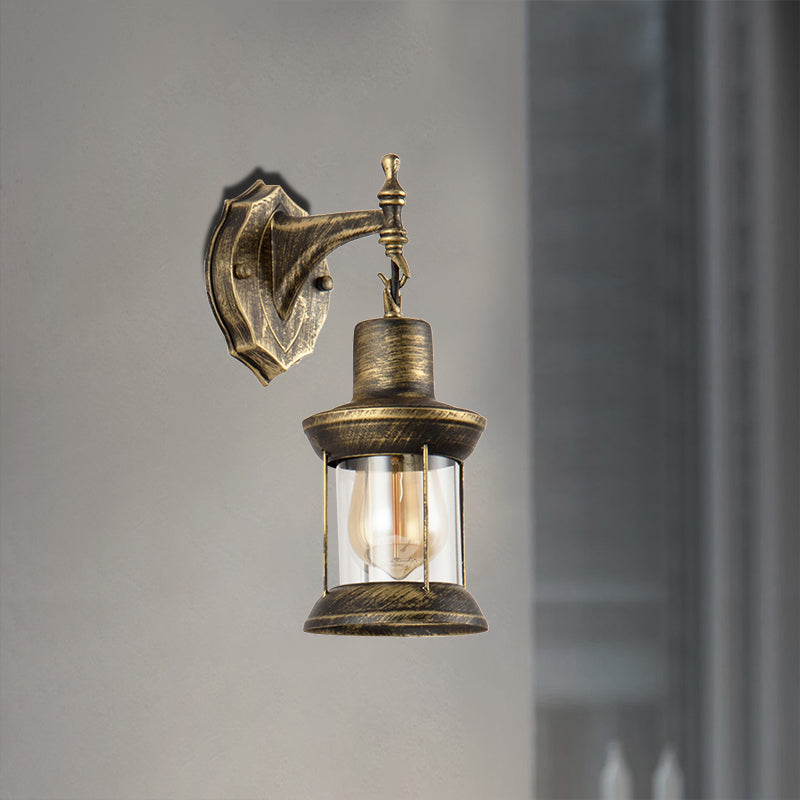 Traditional outdoor wall light with clear glass shade in antique bronze – E27 fitting