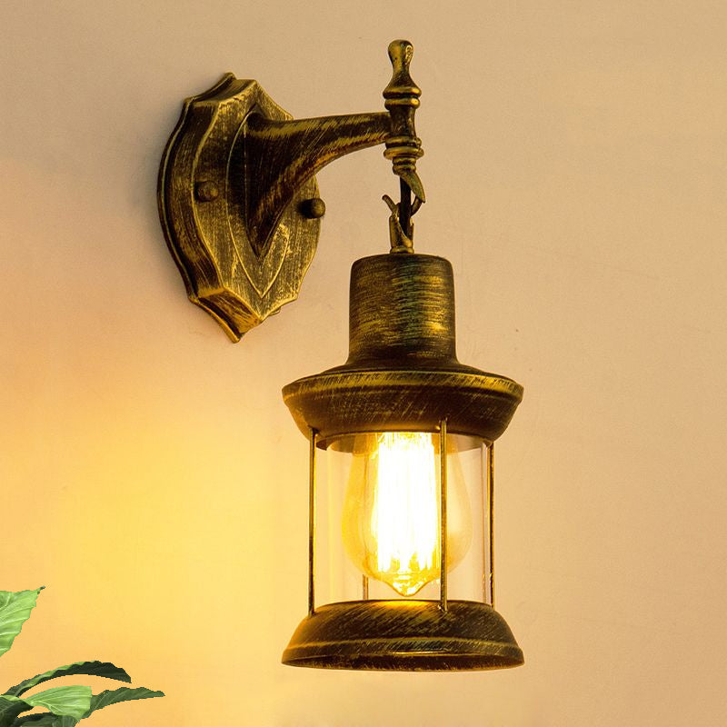 Traditional outdoor wall light with clear glass shade in antique bronze – E27 fitting