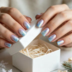 Wintry Artistic Nails with Shimmering Snowflake Design