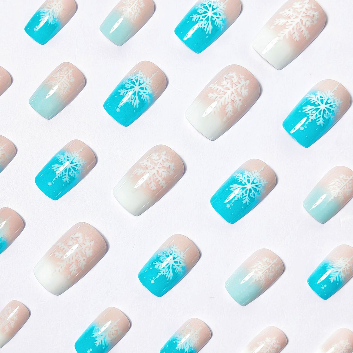 Wintry Artistic Nails with Shimmering Snowflake Design