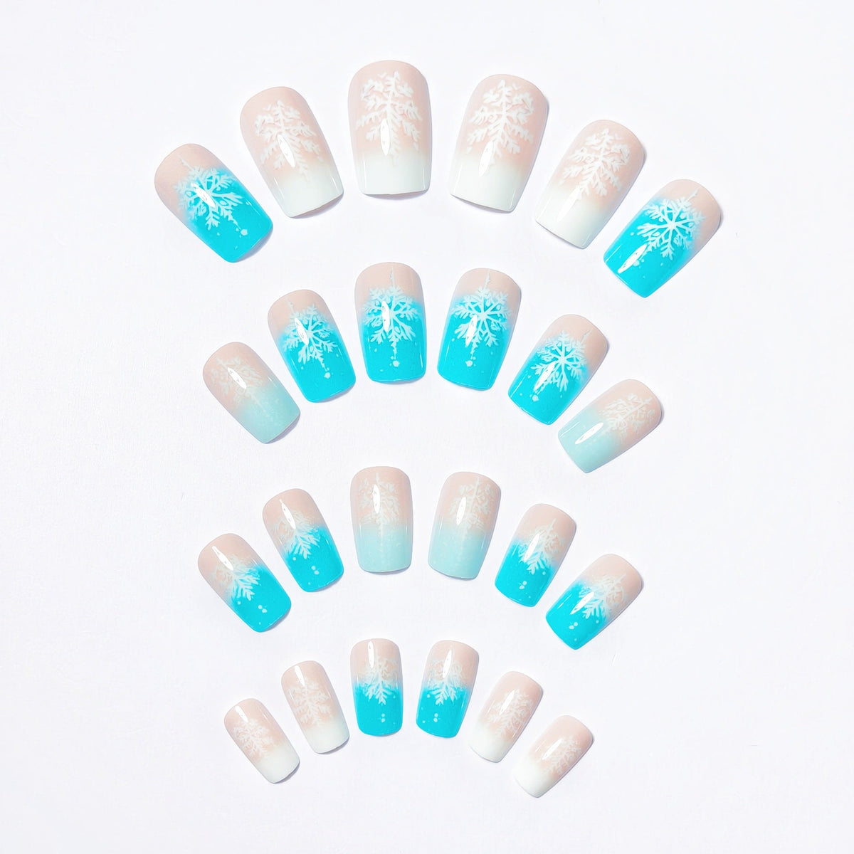 Wintry Artistic Nails with Shimmering Snowflake Design