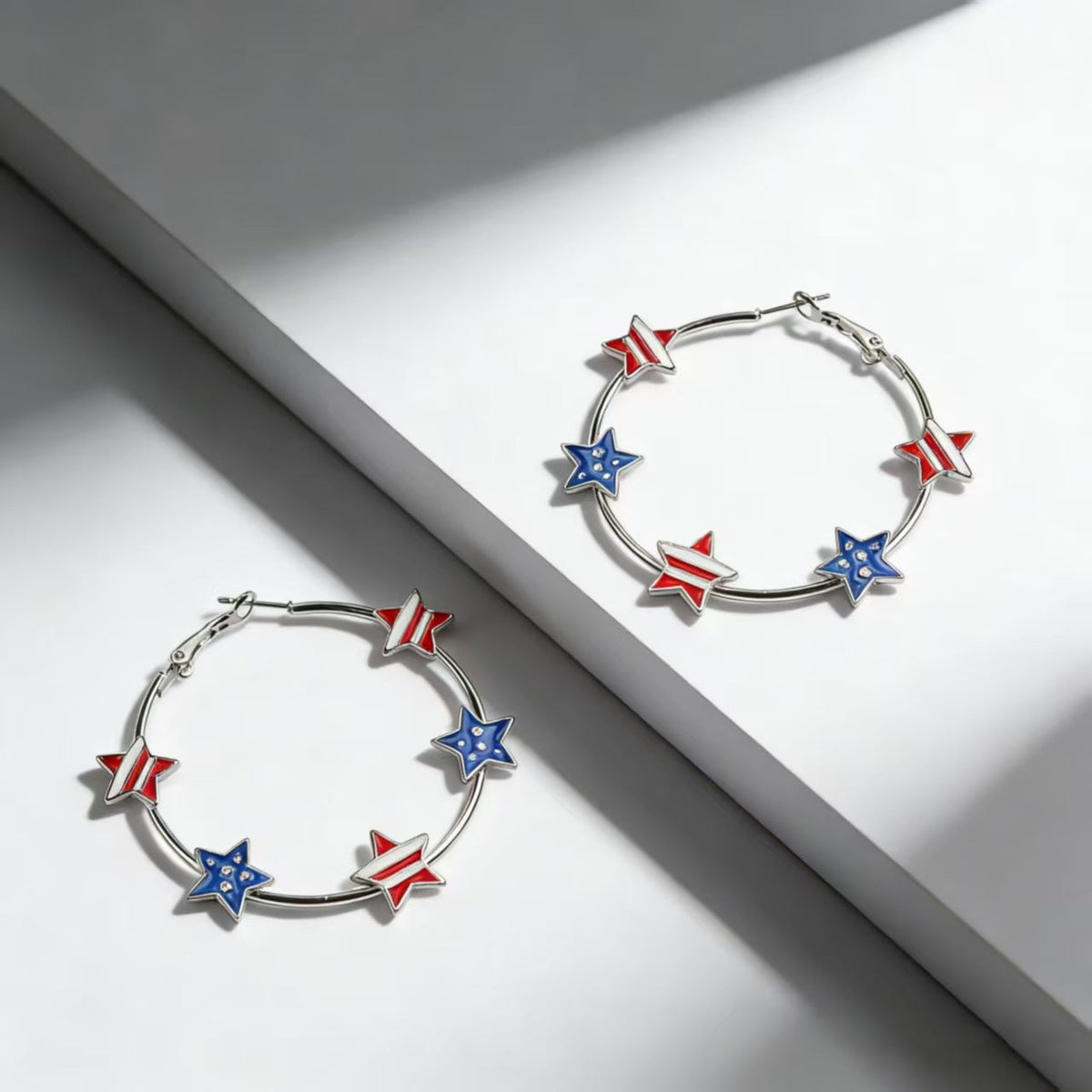 Women's Playful Hoop Earrings with Enamel Star Appliqués and Secure Click Closure