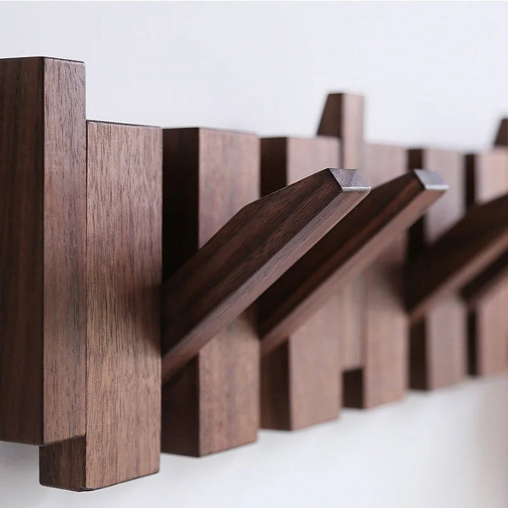 Wooden wall-mounted coat rack with piano key design, elegant and durable