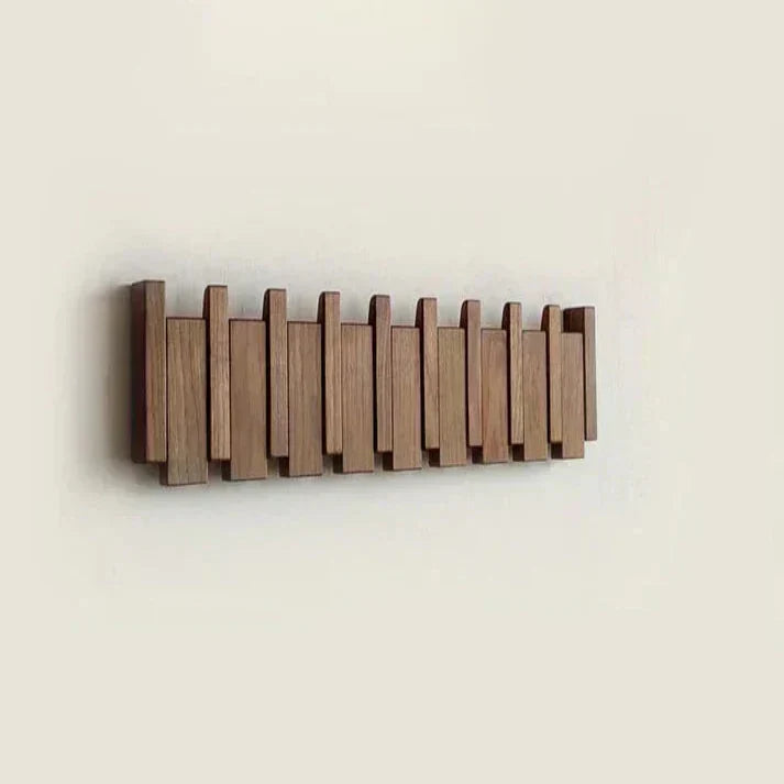 Wooden wall-mounted coat rack with piano key design, elegant and durable