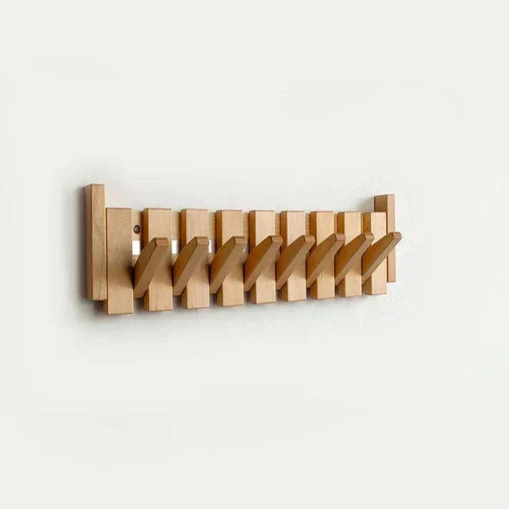 Wooden wall-mounted coat rack with piano key design, elegant and durable