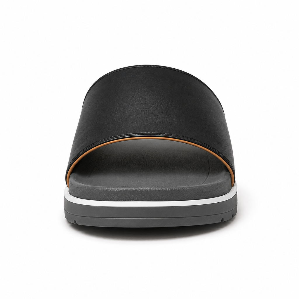 Side profile of men's matte black single-band vegan leather slide sandal showing chunky grey outsole with white midsole stripe and horizontal tread