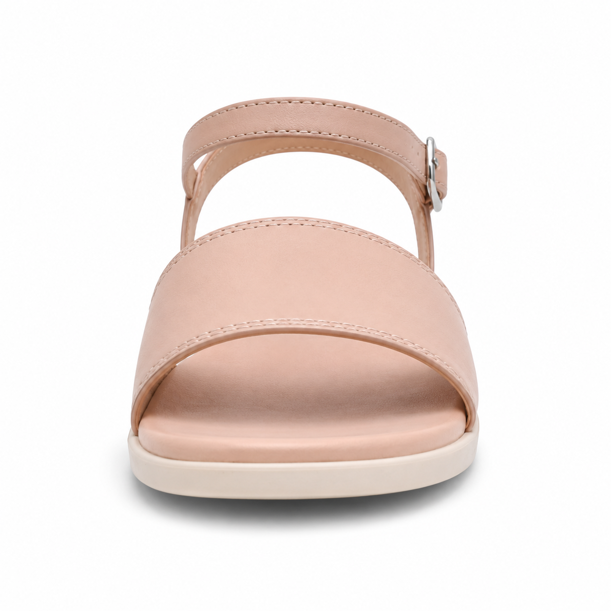 Side profile of women's nude blush single-buckle vegan leather sandal showing the brushed silver ankle buckle