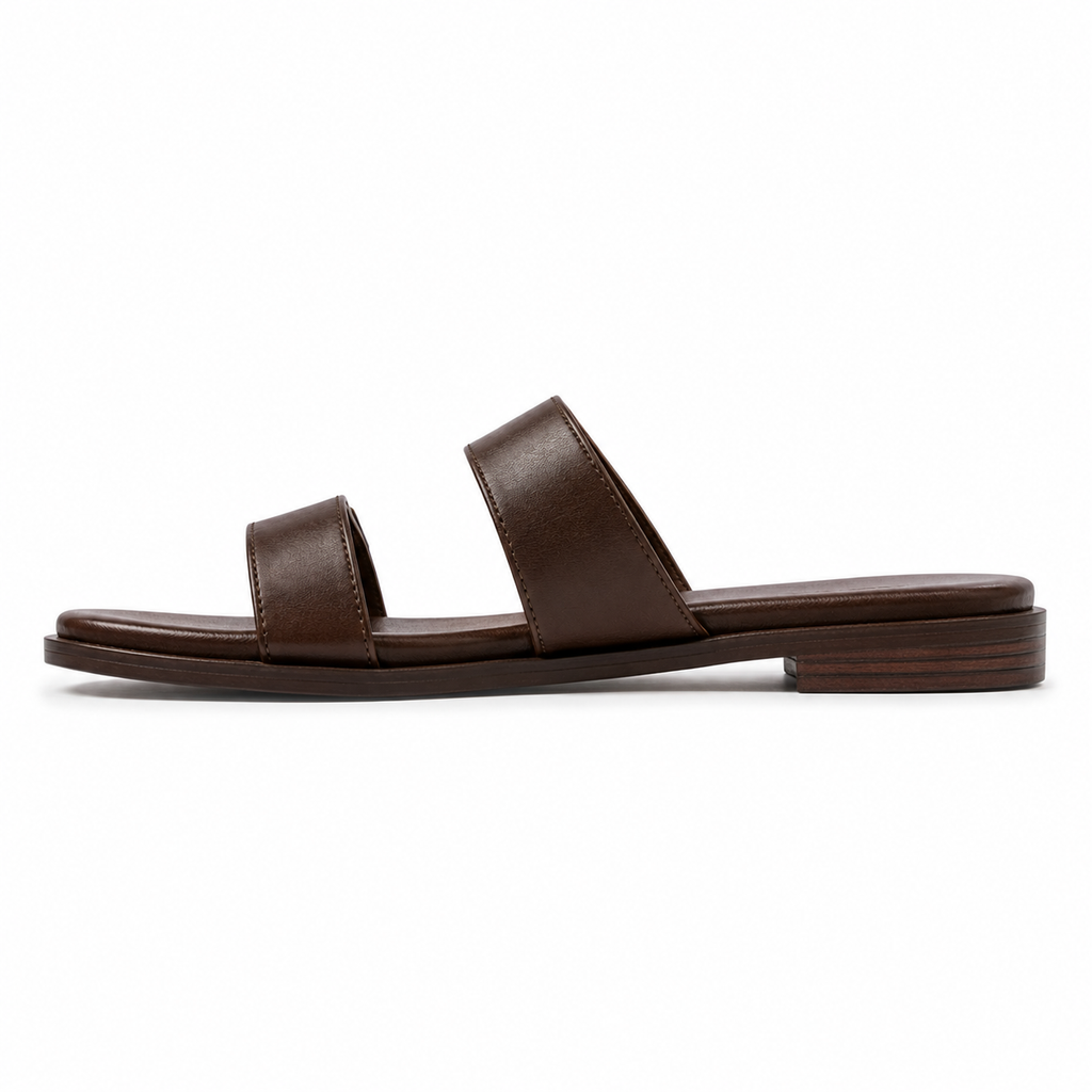 Front view of women's dark walnut double-buckle vegan leather sandal showing both parallel straps and antique brass buckles