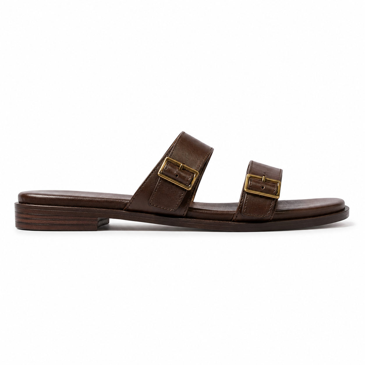 Inner side view of women's dark walnut double-buckle vegan leather sandal showing clean leather profile and stacked sole