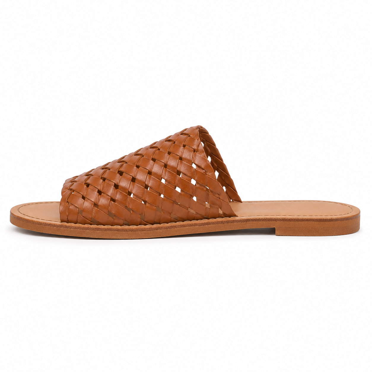 Women's hand-woven vegan leather slide sandal in cognac brown with interlocking diamond pattern and natural tan footbed, three-quarter view