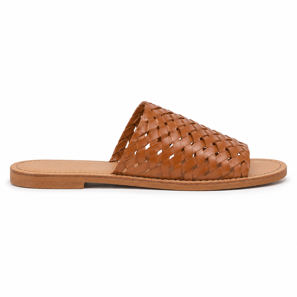 Front view of women's cognac hand-woven vegan leather slide sandal showing the intricate woven pattern over the forefoot
