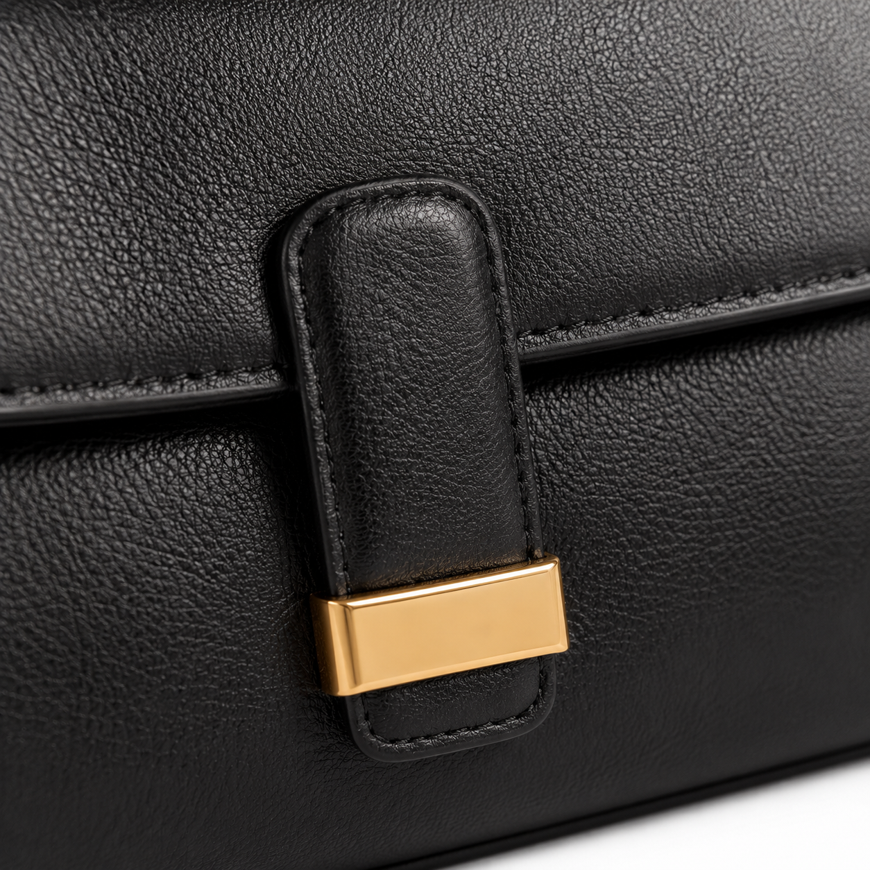 Model wearing boneroshop black faux leather shoulder bag